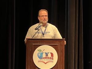 Dr. Ed Nichols at podium